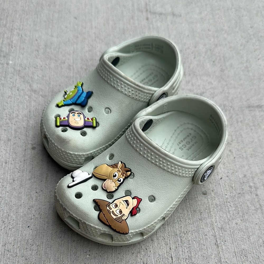 CROCS Kids Light Gray Slip-On Clogs with Toy Story Charms